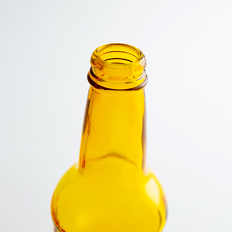 Geltonos spalvos alaus stiklinis butelis